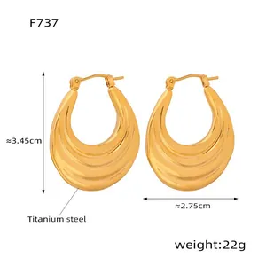 Gold-plated titanium steel crescent hoop earrings featuring a vintage textured finish