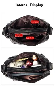 Vue détaillée des compartiments internes et de la grande capacité du sac à bandoulière noir
