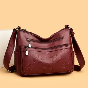 Sac bandoulière bordeaux élégant avec motif trèfle à quatre feuilles pour femmes