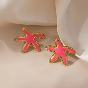 Boucles d'oreilles étoiles de mer en acier inoxydable doré et émail rose pour la plage