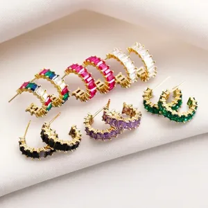 Detailed view of baguette-cut colorful zircon C-shaped hoop earrings in multiple colors