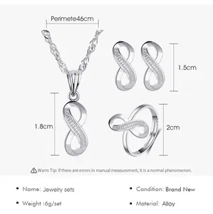 Detailed view of silver infinity jewelry set with dimension markings and material specifications