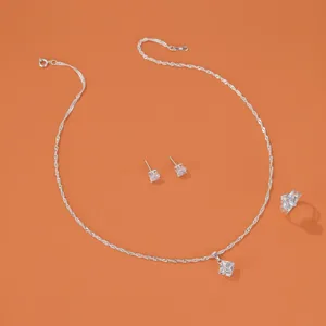Detail view of silver geometric square zircon jewelry set with necklace earrings and ring