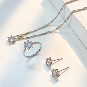Detailed macro shot of zircon necklace, earrings, and ring jewelry set