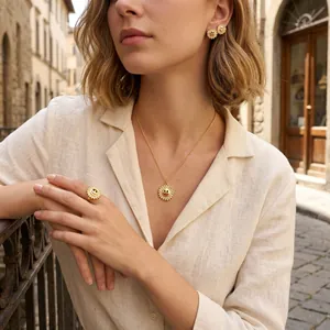 Model wearing a sunflower smiley face gold-plated jewelry set in a European street setting.