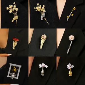 Creative bouquet brooches in gold and silver metal finishes, stylish 3x3 grid display
