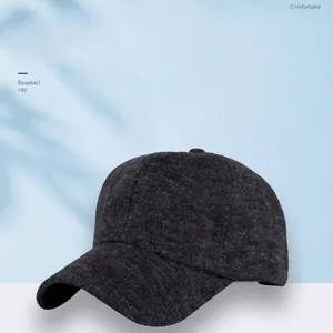 Comfortable dark grey knitted baseball cap with soft wool texture for outdoor winter sports