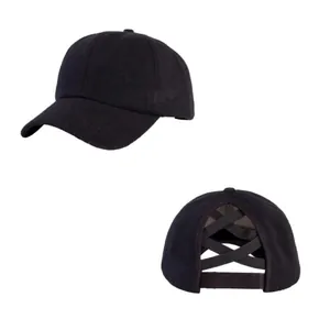 Close-up detail of black knit ponytail baseball cap with criss-cross back design