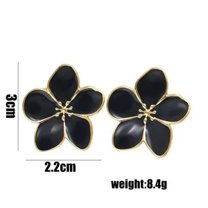 Black enamel cherry blossom earrings with gold trim, 3cm height and 2.2cm width