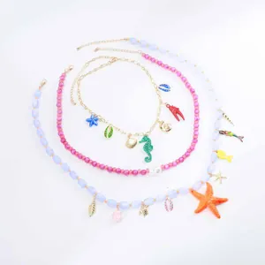 Collane boho in perline con temi marini come stelle marine e ciondoli a conchiglia