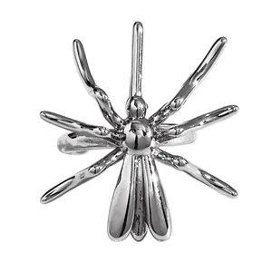 Close-up of silver spider ear cuff with gothic Halloween design