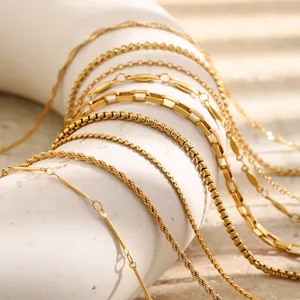 Close-up of various 18K gold plated stainless steel chain necklace textures
