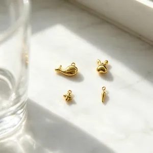 Ensemble de breloques DIY en acier doré : baleine, lapin, étoile et petit piment rouge