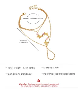 Vue détaillée du bracelet bague papillon doré avec mesures de taille et spécifications