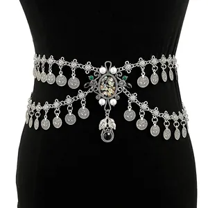 Detailed view of silver bohemian double-layer waist chain with coin charms and shell pendant.