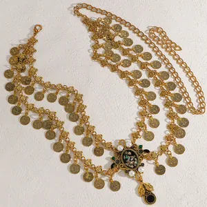 Detailed macro view of vintage gold double-layer coin waist chain with pearl pendant