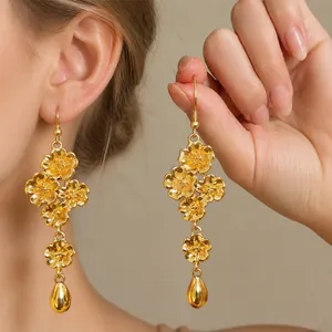 Orecchini retrò a fiori dorati con eleganti pendenti a goccia d'acqua
