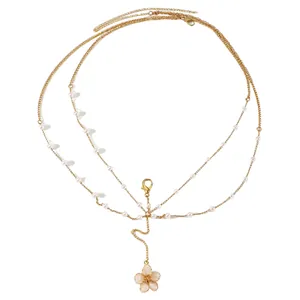 Golden multi-layer body chain with delicate faux pearls and floral shell pendant
