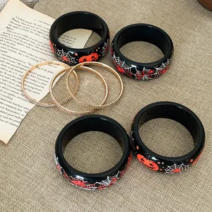 Bracciali Halloween in resina con zucca e ragnatela e braccialetti d'oro set.