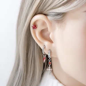Gothic style red zircon earring set with cross pendant and dragon claw stud on ear