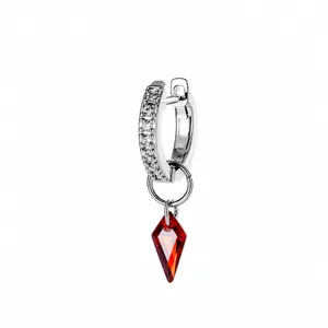 Silver huggie earring with dragon claw set stones and red kite-shaped pendant charm