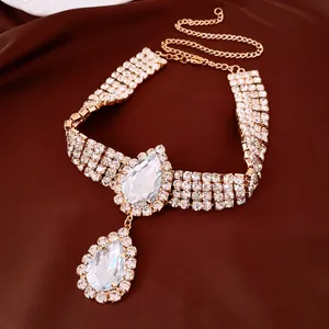 Close-up of elegant rhinestone choker necklace with large teardrop crystal pendants