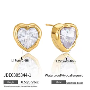 Gold heart stud earrings in stainless steel with clear heart-shaped cubic zirconia detail