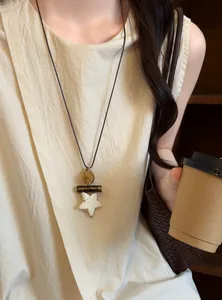 Retro ethnic style long necklace with white star pendant and marbled beads for women