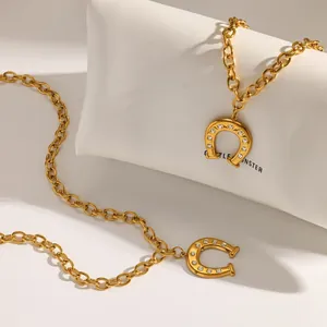 Elegant 18K gold plated stainless steel horseshoe pendant necklace and bracelet set