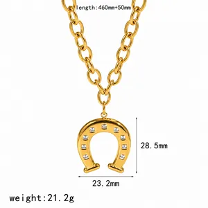 Close-up detail of golden stainless steel horseshoe necklace with weight and size data
