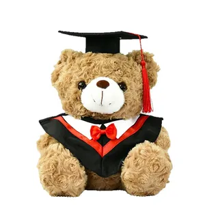 Soft brown plush graduation teddy bear wearing black bachelor gown and red tassel cap