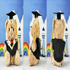 Detail views of graduation teddy bear plush wearing black academic gown and cap