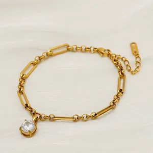 Gold-toned paperclip bead chain bracelet featuring a large round clear zircon pendant