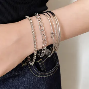 Set da 4 pezzi in argento con catena di strass, bracciale a nodo e maglie spesse