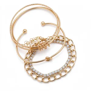 Elegante set di 4 braccialetti color oro con catena di strass e dettagli a nodo
