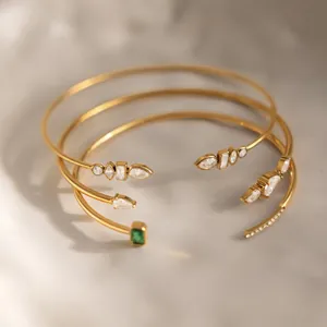 Elegant 18K gold plated stainless steel open cuff bracelets set with sparkling cubic zirconia