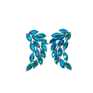 Elegant feather wing stud earrings with vibrant blue and green marquise crystals