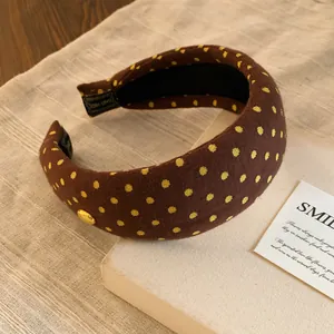 Serre-tête rembourré vintage marron à pois jaunes avec détail en métal doré élégant
