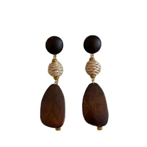 Handmade holiday style wooden geometric drop earrings with woven bead detail