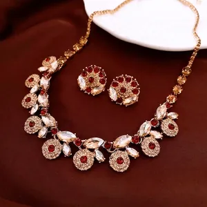 Vintage French court style jewelry set with red and clear rhinestones