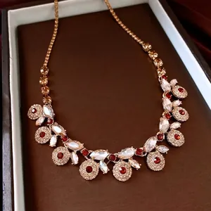 Vintage French court style necklace with red and white rhinestones in gold finish