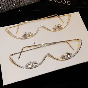Gafas sin montura exageradas con pedrería de corazón en acabado oro y plata