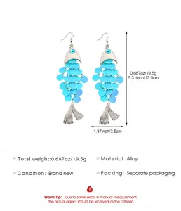 Boucles d'oreilles poisson à paillettes bleues avec dimensions et détails précis
