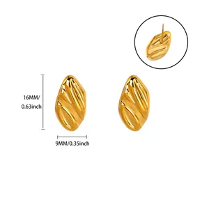 Close-up detail view of gold textured earrings with size dimensions in mm and inches