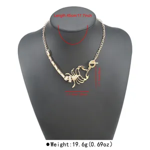 Detailed view of gold scorpion necklace with rhinestones and precise size measurements.