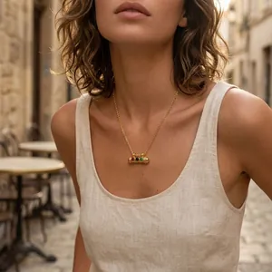 Chic 18K gold plated necklace featuring a colorful crystal capsule pendant on model