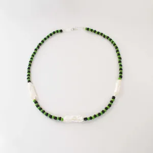Handmade green and black seed bead necklace featuring three irregular baroque freshwater pearls