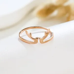 Close-up detail of a rose gold deer antler open ring with a minimalist design
