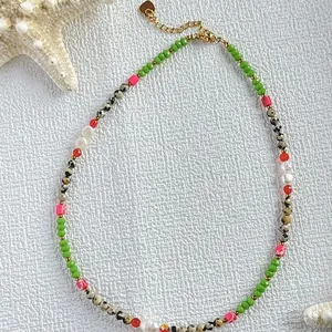 Handmade colorful natural stone choker necklace featuring genuine freshwater pearl details.