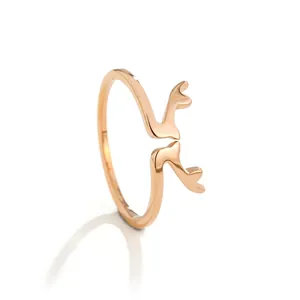 Rose gold adjustable ring featuring minimalist deer antler design on white background